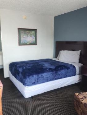 Queen Bed Hotel Room 104