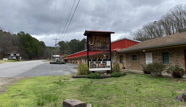 Queen Guest Room located at the Joplin Inn at the entrance to Mountain Harbor, just 2 1/2 miles from Lake Ouachita. by RedAwning