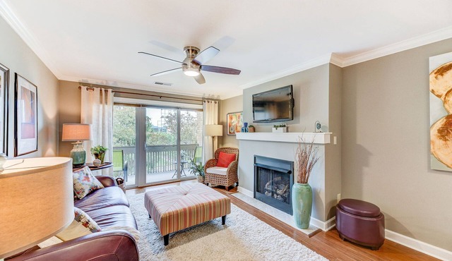Quiet 1 Bed condo with in unit laundry & assigned covered parking in secure bldg