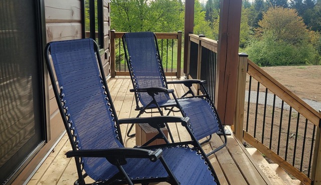 Quiet Cabin in the woods, on 50 acres with trails to soak in Nature.