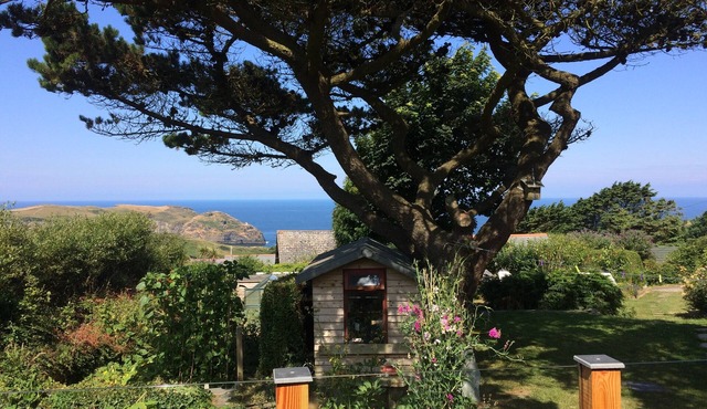 Quiet chalet with beautiful rural and sea views near St Nectan's waterfall.