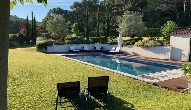 Quiet contemporary house with secure heated pool and large garden