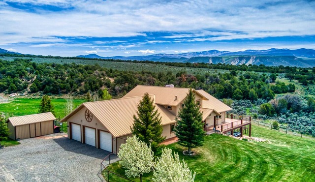 Quiet country getaway with STUNNING VIEWS, 4 bedrooms, 3 1/2 bath, large garage.