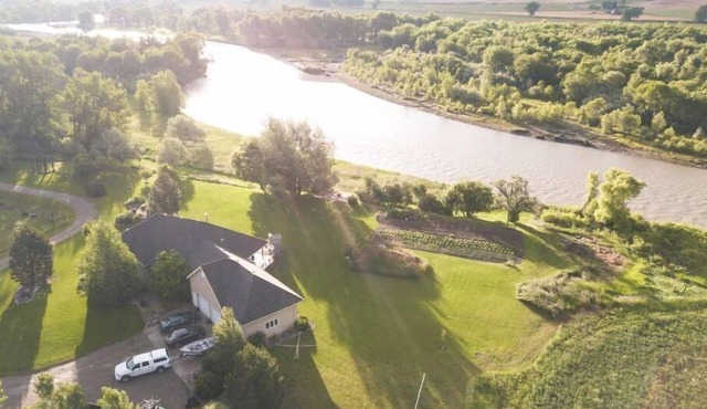 QUIET COUNTRY LIVING AT RIVER'S EDGE