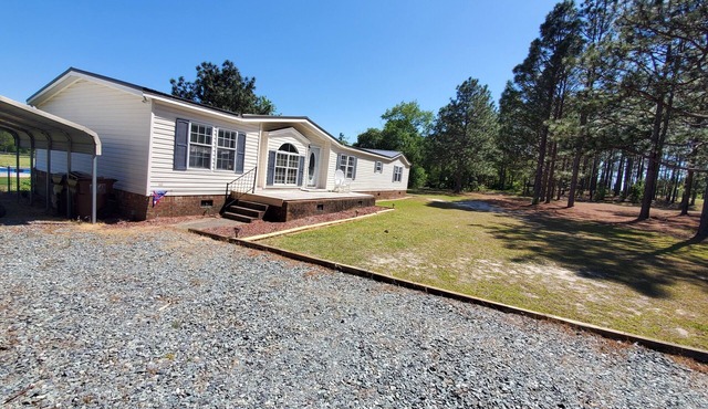 Quiet country living only minutes from town & golf.