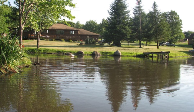 Quiet Country Log Home on three ponds. All we overlook is the scenery.