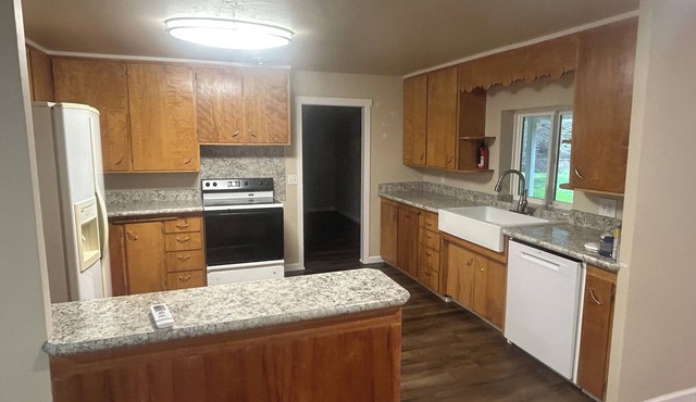 Quiet country neighborhood house is on 2.5 acre lot,includes water, sewer, power