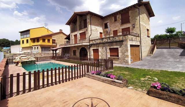 Quiet house on the outskirts of the city surrounded by pine forests and hills.
