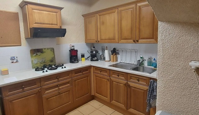 Quiet house in a wooded park with a large swimming pool and lounge area