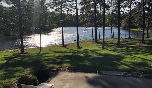 Quiet lake front property in peaceful neighborhood setting.
