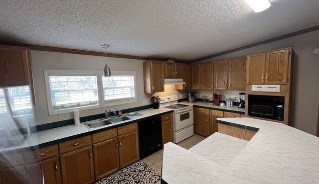 Quiet., Large home on 2 acre estate that can host large groups close to town.
