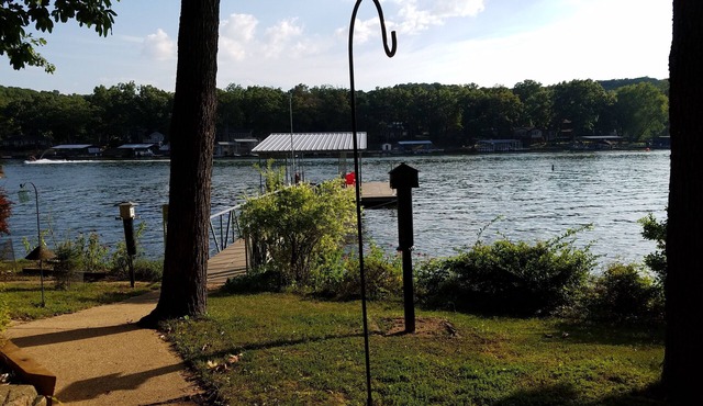 Quiet location, beautiful lakefront home in a cove. Private covered boat dock!n