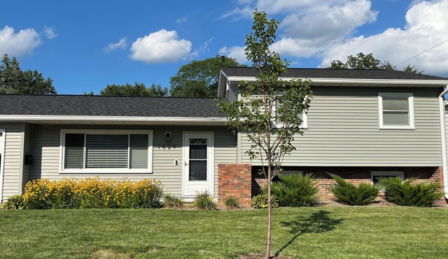 Quiet neighborhood surrounded by parks near multipurpose trail through QCn