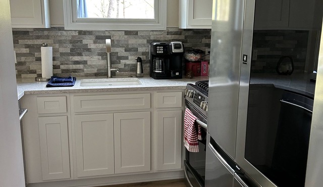 Quiet retreat nestled in the woods.