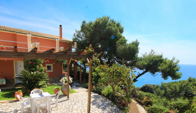Quiet villa on Pelekas beach with 3 apartments and panoramic sea views