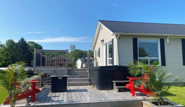 Quiet Waterfront Cottage w/Hot Tub, River View & Access only 2 min to Boat Ramp
