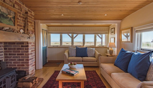 Quirky holiday cottage right on the beach at Dungeness in Kent.