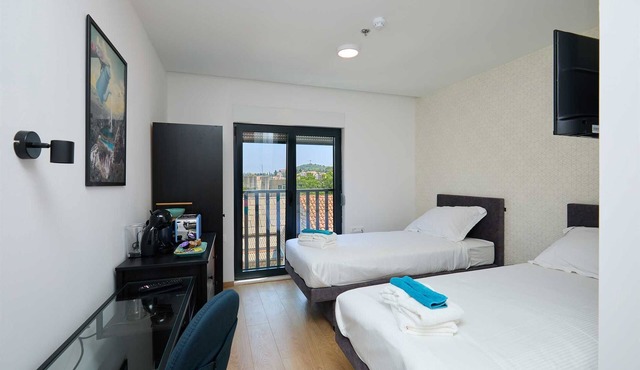 R6 Standard double or twin room DOMINIUM CITY SUITES