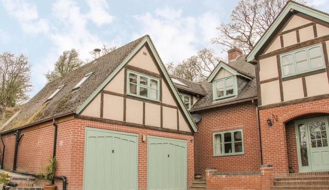 RAGLETH PLACE LODGE, pet friendly, with open fire in Church Stretton