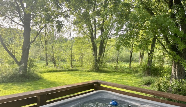 Ranch featuring 3 King beds, New Hot tub on several acres, & fishing creek.