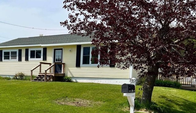 Ranch home with 3 bedrooms upstairs and 1 down. Refurnished June of 2022