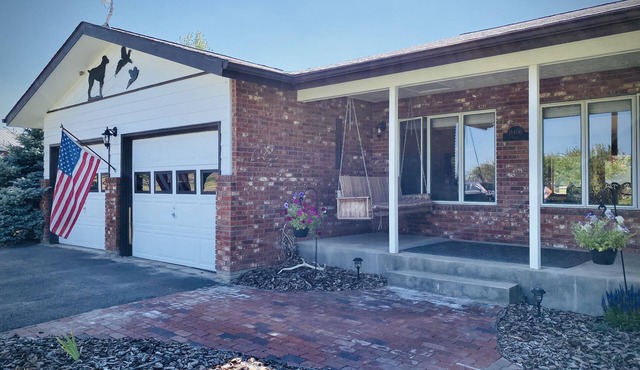 Ranch-style home with horse property and fenced yard