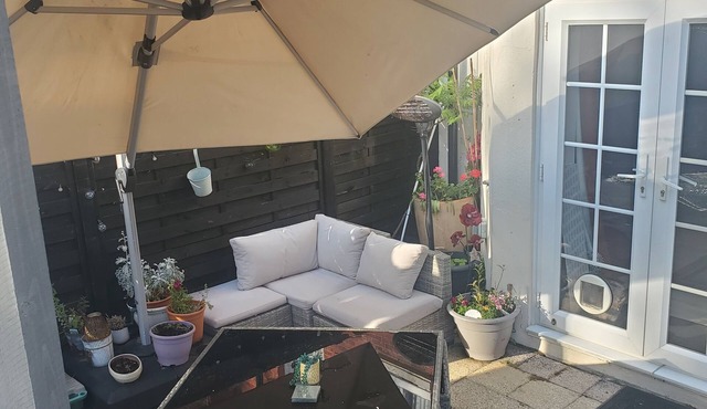 Rare basement flat in best location,free parking on site, private sunny patio