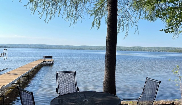 Rare Find. in Petoskey , beautiful home sleeps 8 with lake frontage and woods.