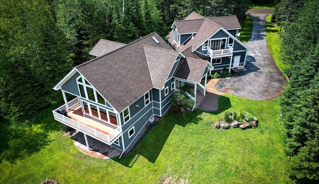 Rare large contemporary four bedroom home with forest and lake views + EV Charge