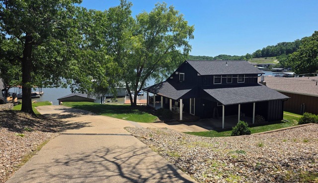 Rare level lot with boat launch on site. Wood burning fireplace. Dog friendly.