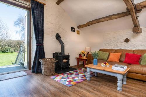 Ravendale, Kirkoswald in a rural setting with wood burning stove