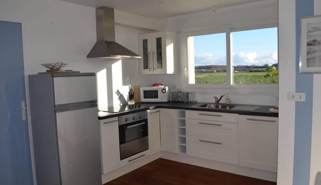 Recent house with large garden at 700 m. from the small harbour and the beach