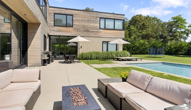 Recently constructed modern-style home with a gated entrance, private pool,.