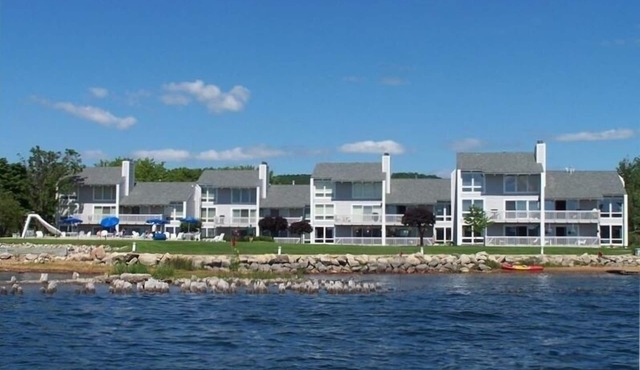 RECENTLY REMODELED directly on Lake Charlevoix Boat Slip Pool Deck Walkout Wifi