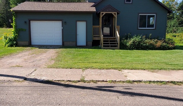 Recently remodeled home, across street from Michigan Snowmobile/ORV Trail #2!