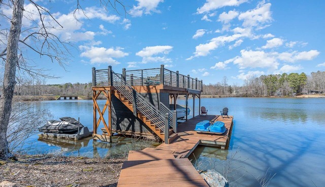 RECENTLY RENOVATED - 180-degree views, 2-story boathouse & OPTIONAL BOAT RENTALS