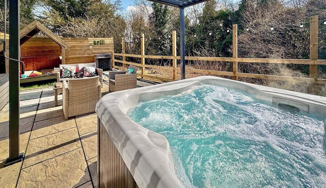 Recently upgraded to include Tilt and turn Gazebo over hot tub.