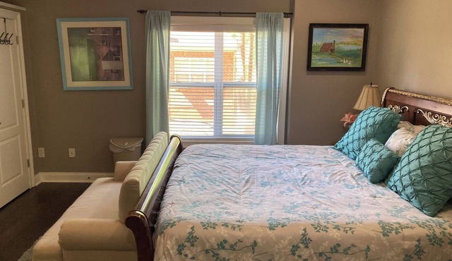 Recharge here. One large bedroom within a furnished, terrace level apartment.