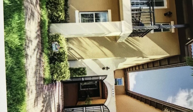 Recharge in this Mediterranean-style townhome