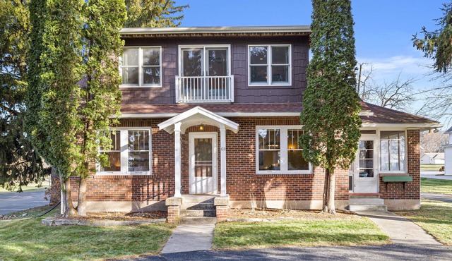 Red Brick Home across the street from Green Lake and near downtown!