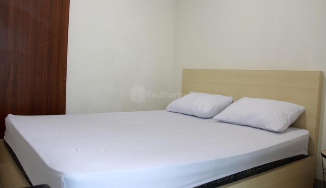 RedLiving Apartemen Grand Kamala Lagoon - Swastika F88 Group Tower Barclay North