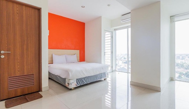 RedLiving Apartemen Grand Kamala Lagoon - Rooms 911 Tower Barclay South with Netflix
