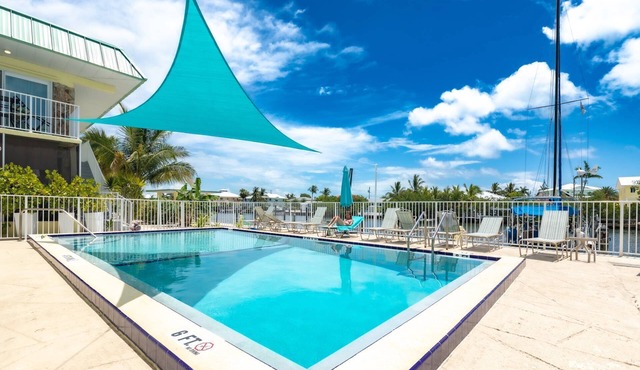 Reel Escape 2: Charming 2nd Floor Condo in Marathon, Dock, Ramp, Shared Pool & Close to Everything!