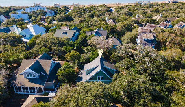 Reel Life tucked into a pretty, wooded bend in prestigious Cape Fear Station!