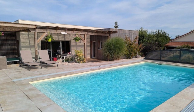 Refined holiday home with terrace and shared pool