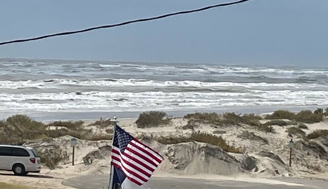 Relax and enjoy water views of the Gulf and beautiful home so near the beach!