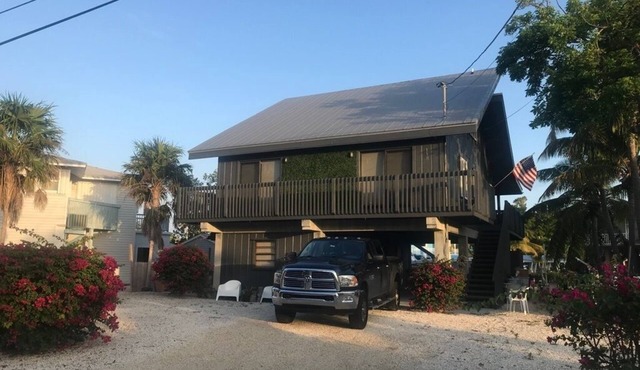 Relax And Get Away To This Prestine Keys Style Home