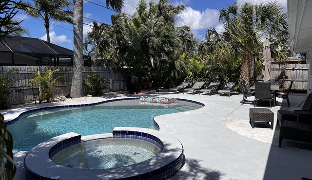 Relax and have some fun in this Salt water heated pool home, 5min walk to beachn