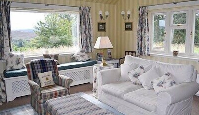 Relax and unwind in this cosy croft house with a woodburner.