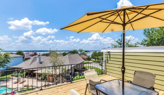 Relax and unwind on the deck with water view of Lake Conroe